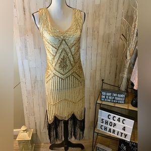 Fundaisy flapper style dress with gold beading. Style S